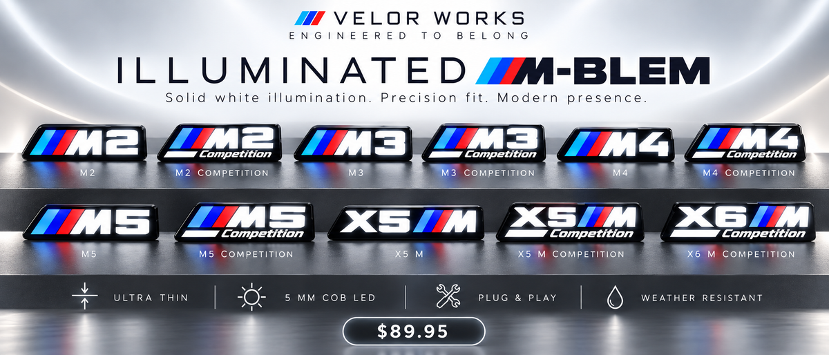 Illuminated M grille emblem for BMW M3, M4, M5 and X5 M with solid white lettering and tri-color stripes