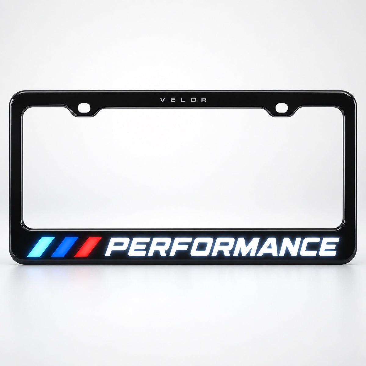 Illuminated LED license plate frame front view with white PERFORMANCE lettering and tri-color bars