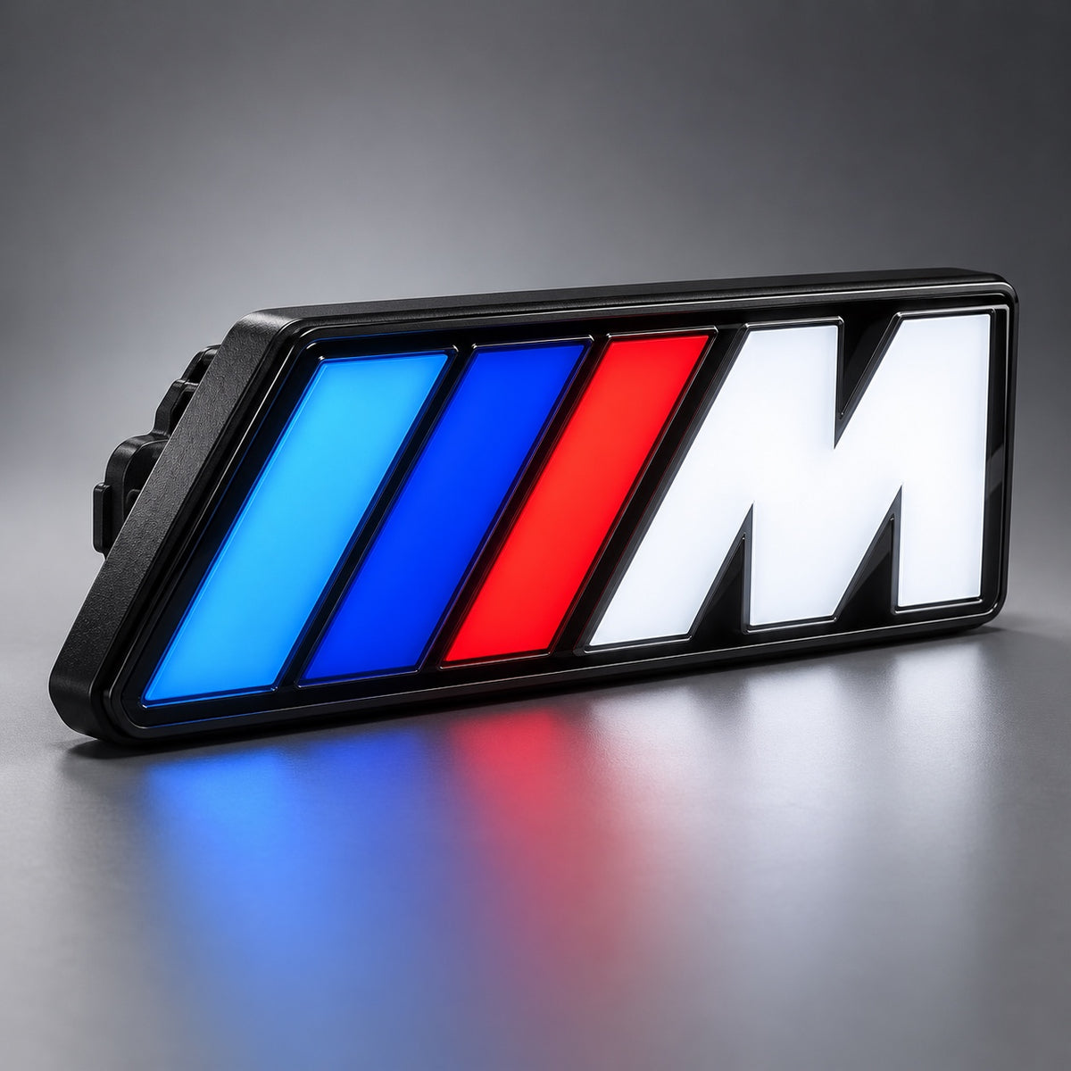 Velor Works universal illuminated M emblem alternate angled view