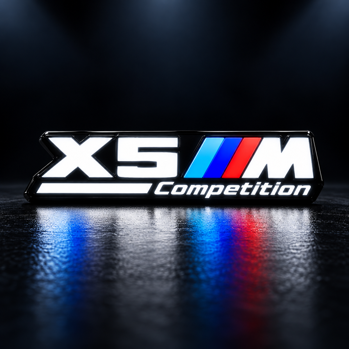 Velor Works X5 M Competition illuminated emblem design render with solid white letters, Competition rail, and fixed tri-color stripes