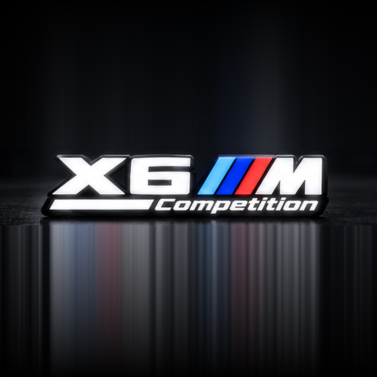 Velor Works X6 M Competition illuminated emblem design render with solid white X6 and M letters, Competition rail, and fixed tri-color stripes