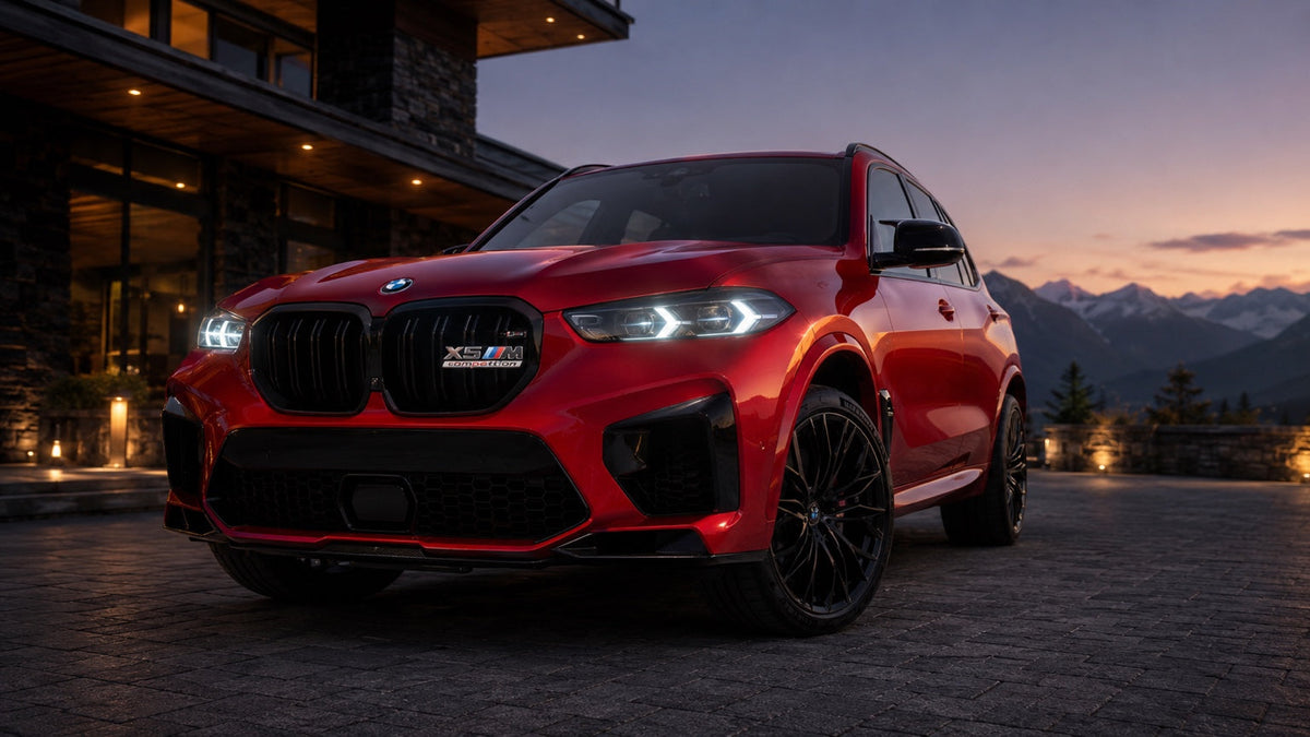 Velor Works illuminated X5 M Competition grille emblem shown on a red BMW X5 M