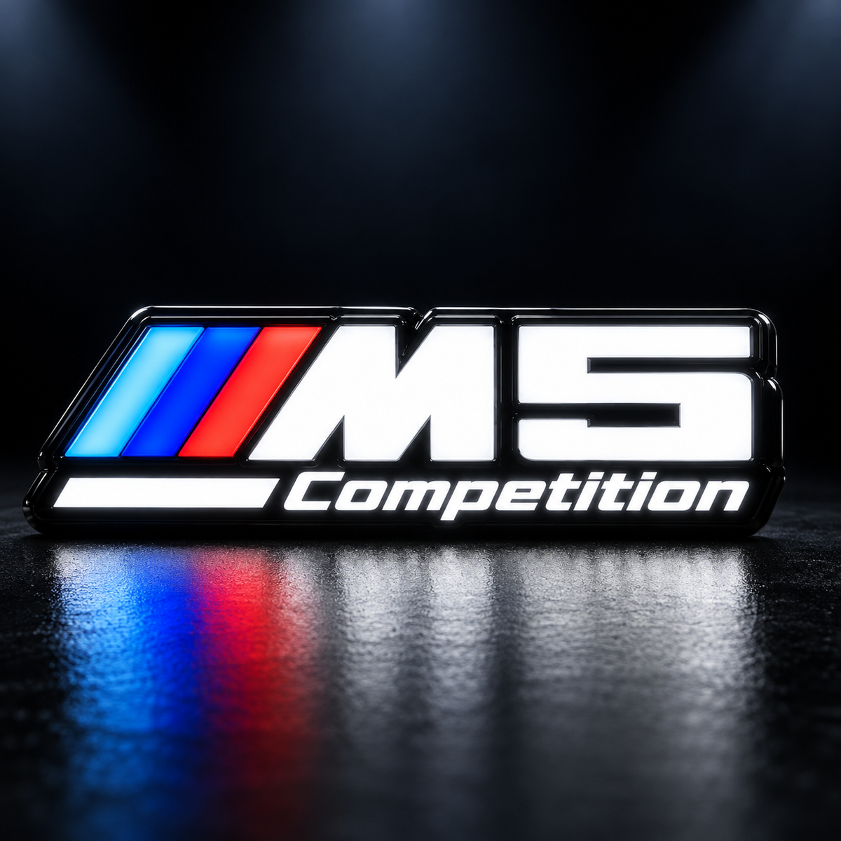 Velor Works M5 Competition illuminated emblem design render with solid white letters, Competition rail, and fixed tri-color stripes