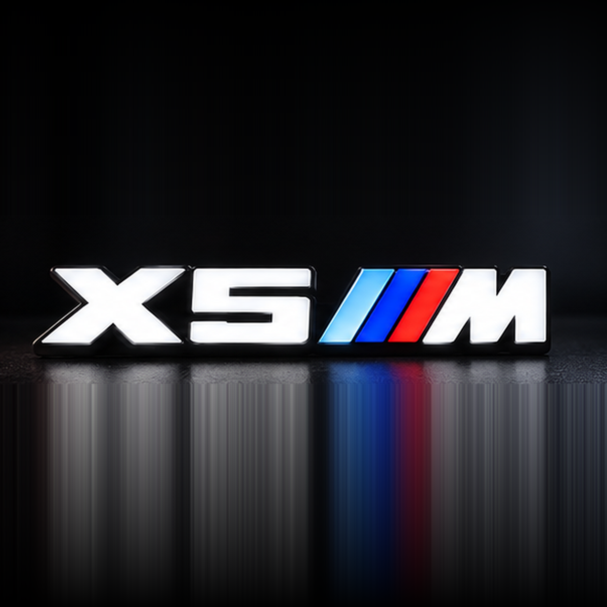 Velor Works X5 M illuminated emblem design render with solid white X5 and M lettering, tri-color stripes, and no bottom rail